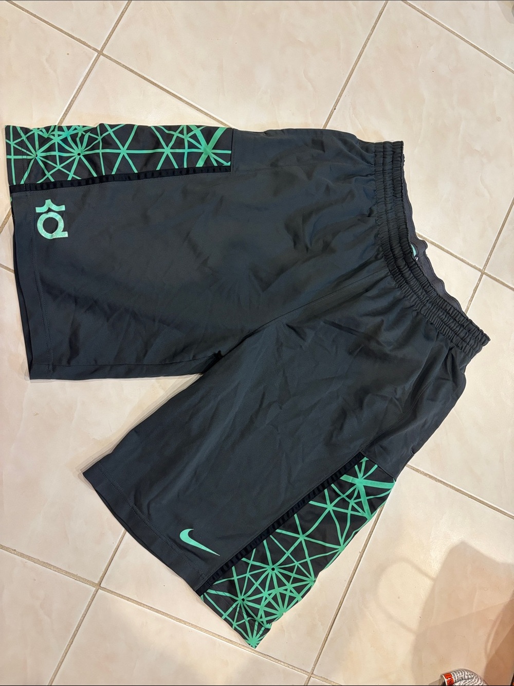 Nike Men’s Black Athletic Shorts with Teal Geometric Panels